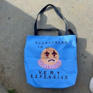 Blue Tote Bag with Sad Face Design
